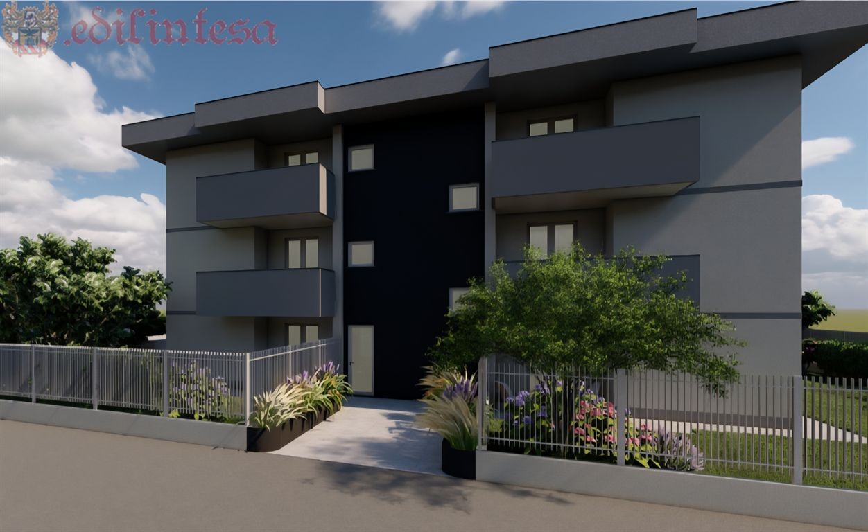 TRILOCALE CON BELLISSIMO GIARDINO IN NUOVA ED ELEGANTE PALAZZINA